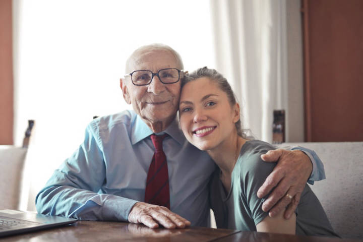 A senior father and his daughter at an Assisted Living facility